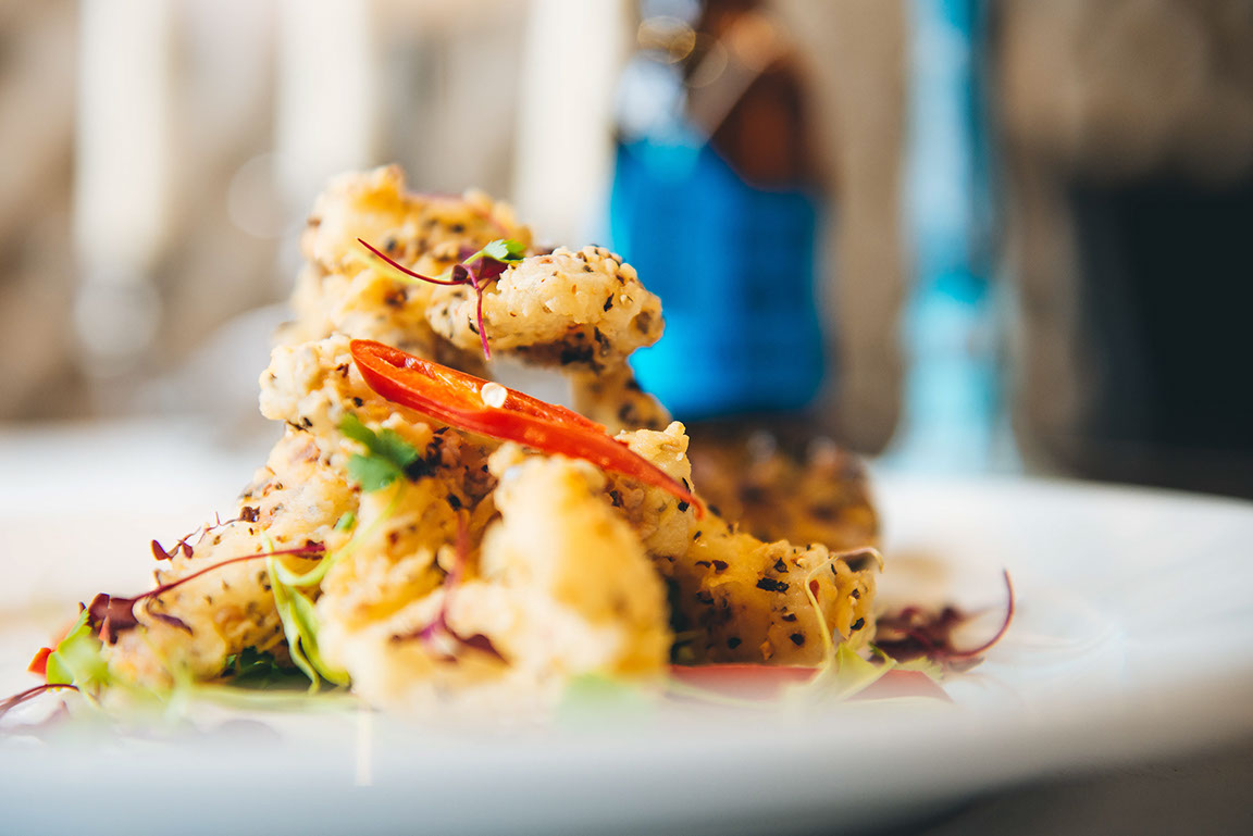 Crispy tempura dish with dipping sauce